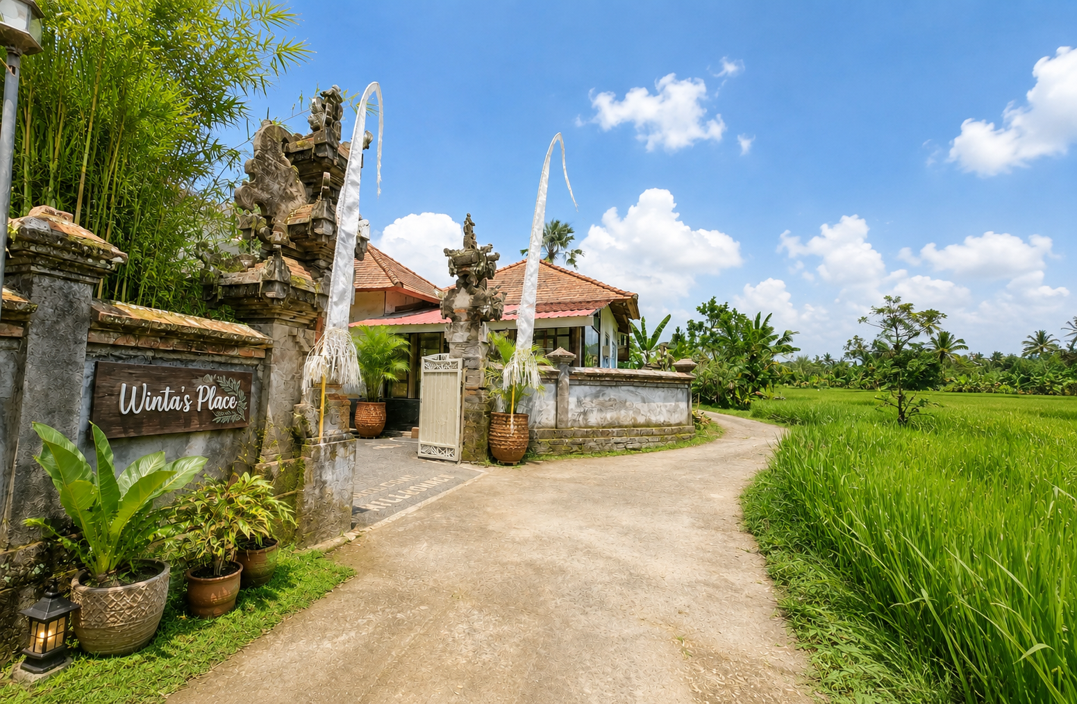 Driveway and Winta's Place sign at the entrance to the school in Ubud, Bali